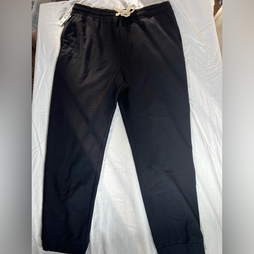 New Men’s RSQ black joggers size XL. Made‎ with recycled polyester.